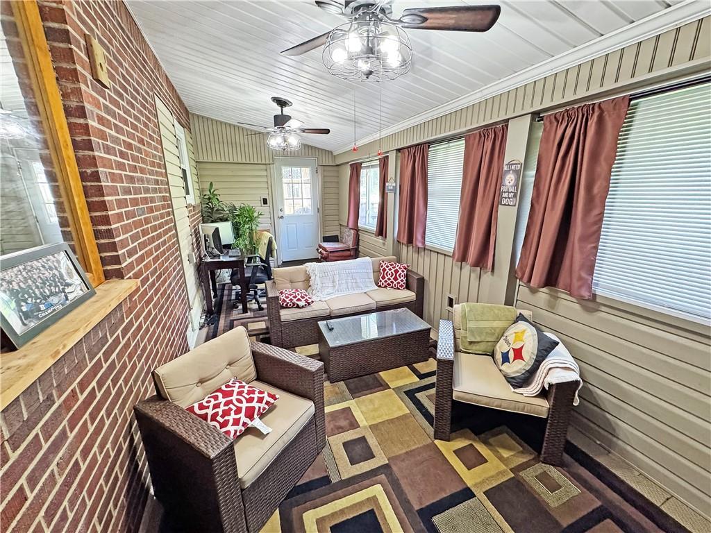 5422 Library Road Bethel Park, PA 15102 - Photo 13 of 27 Enclosed porch with two ceilings fans.