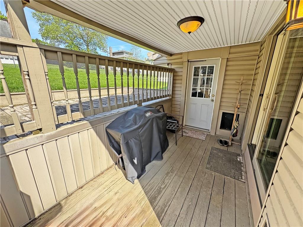5422 Library Road Bethel Park, PA 15102 - Photo 22 of 27 Deck area off the dining room and enclosed porch.