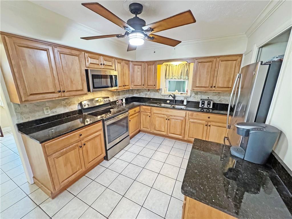 5422 Library Road Bethel Park, PA 15102 - Photo 9 of 27 Updated kitchen with birch cabinets and granite countertops.