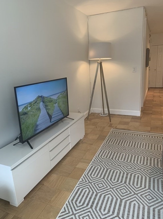 65 East India Row, Unit 10A Boston, MA 02110 - Photo 9 of 17 a view of a living room and entryway