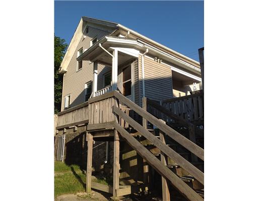 556 Bernon Street Woonsocket, RI 02895 - Photo 12 of 12 Exterior Back. stairs down to 1 car garage