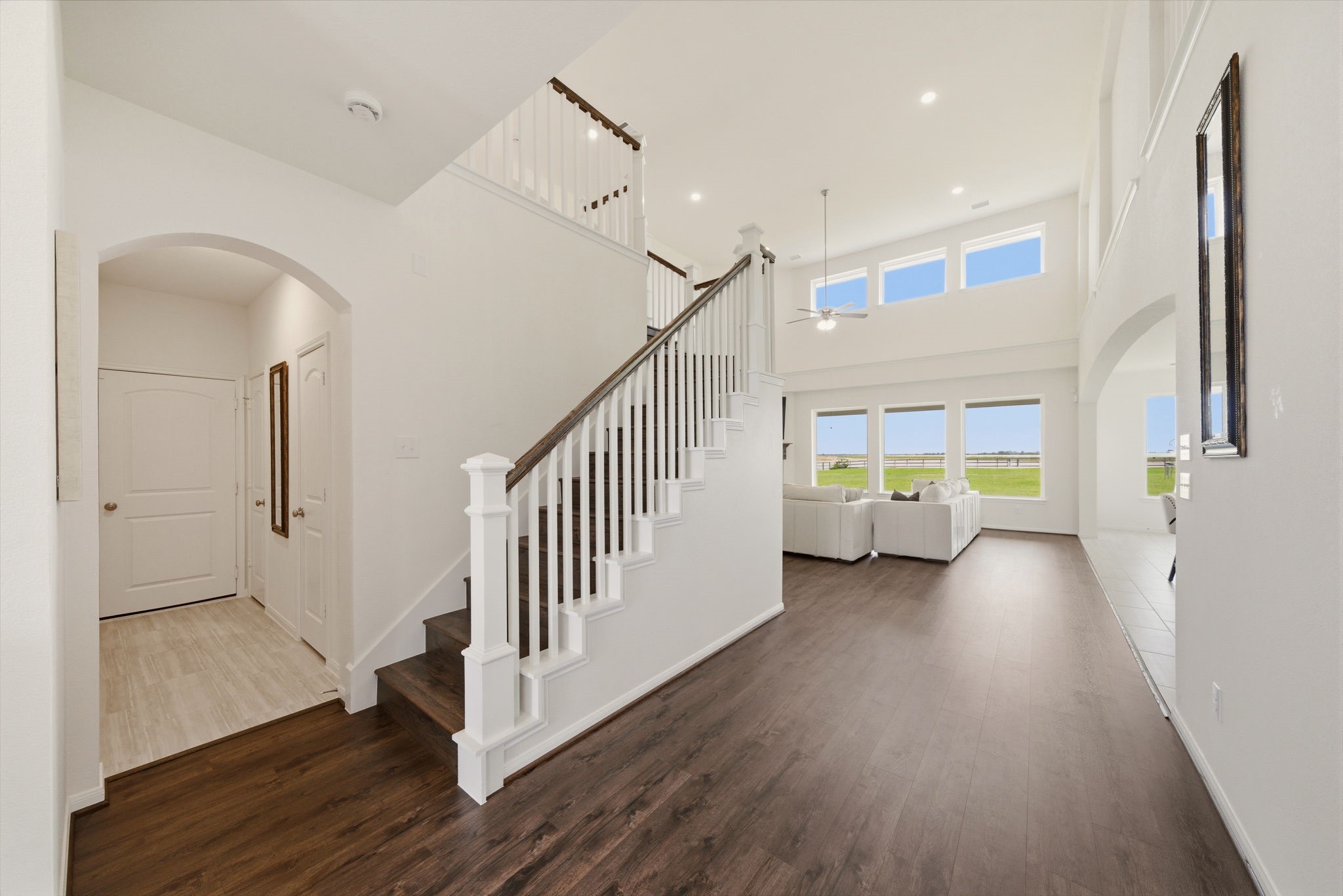 4012 Edgewater Ter Lane Waller, TX 77484 - Photo 19 of 42 a view of entryway and hall with wooden floor