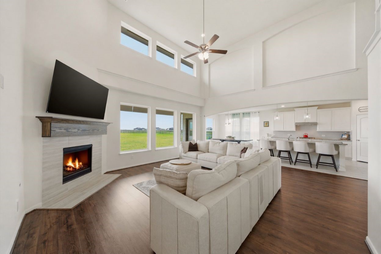 4012 Edgewater Ter Lane Waller, TX 77484 - Photo 2 of 42 a living room with furniture fireplace and flat screen tv