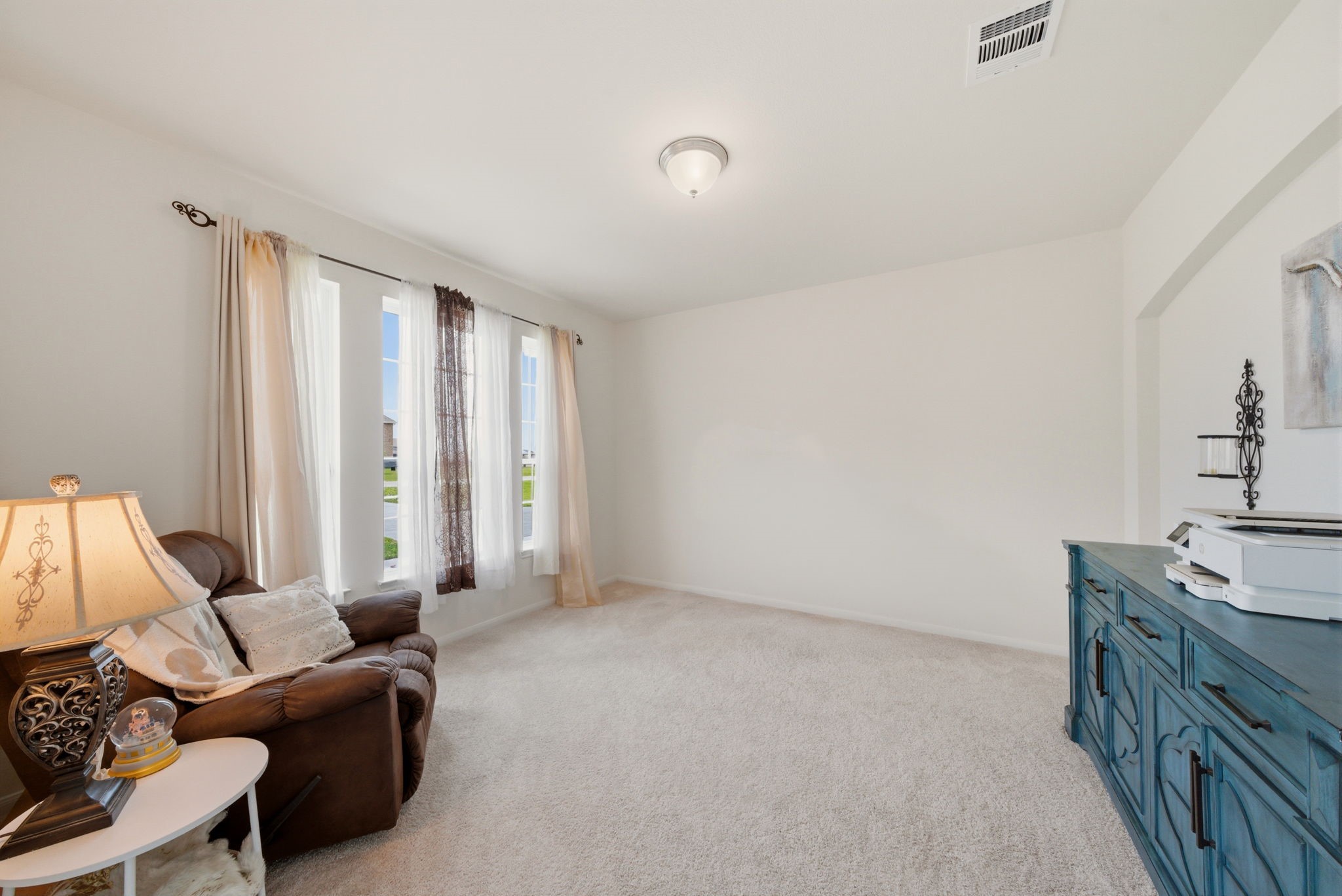 4012 Edgewater Ter Lane Waller, TX 77484 - Photo 23 of 42 a living room with furniture and a window