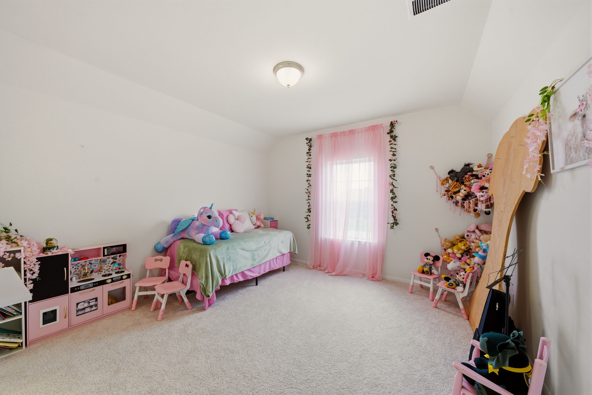 4012 Edgewater Ter Lane Waller, TX 77484 - Photo 28 of 42 a bedroom with furniture and a flat screen tv