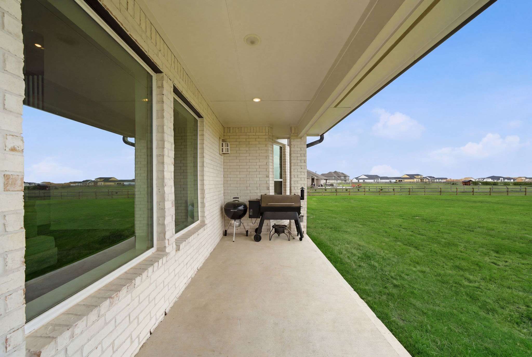 4012 Edgewater Ter Lane Waller, TX 77484 - Photo 35 of 42 a view of a patio with garden