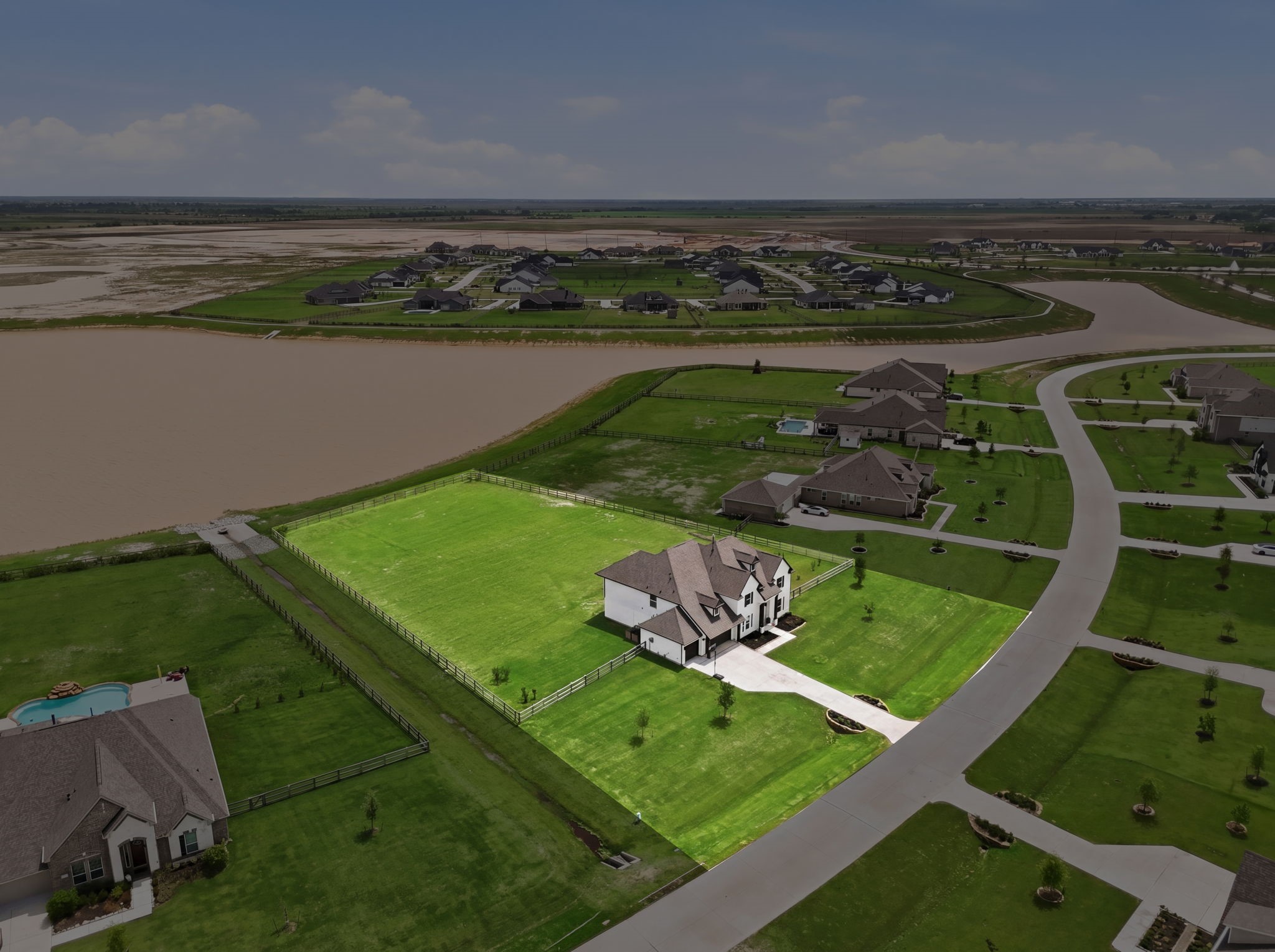 4012 Edgewater Ter Lane Waller, TX 77484 - Photo 41 of 42 an aerial view of a golf course with an ocean view