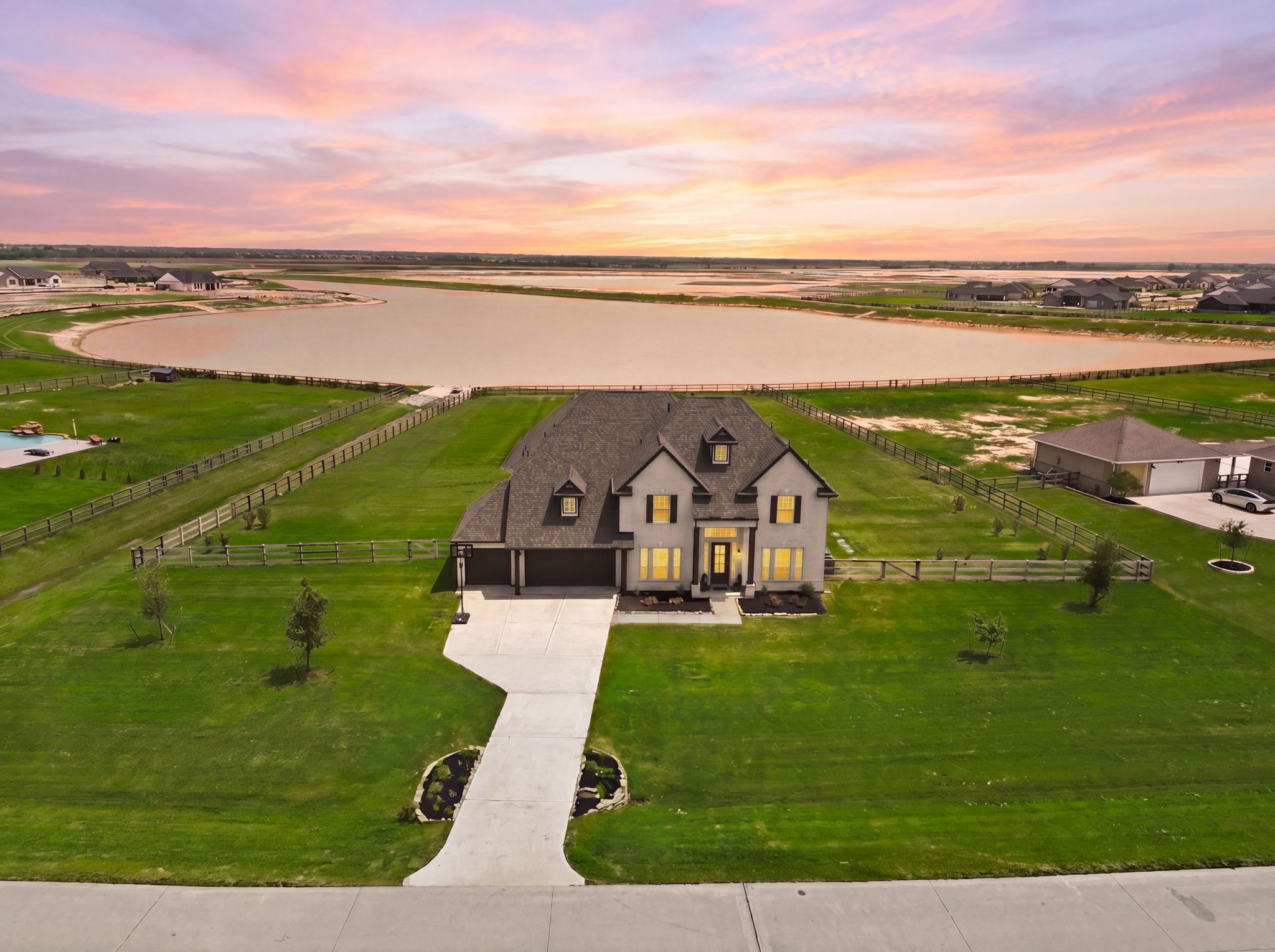 4012 Edgewater Ter Lane Waller, TX 77484 - Photo 6 of 42 a view of a lake with a big yard