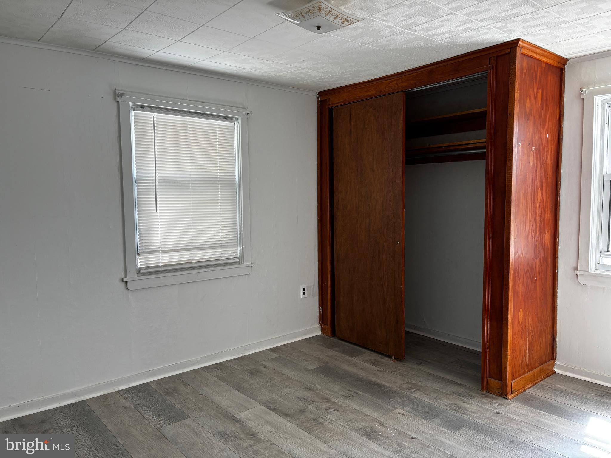 2044 Mill Road Norristown, PA 19403 - Photo 16 of 55 an empty room with wooden floor and closet