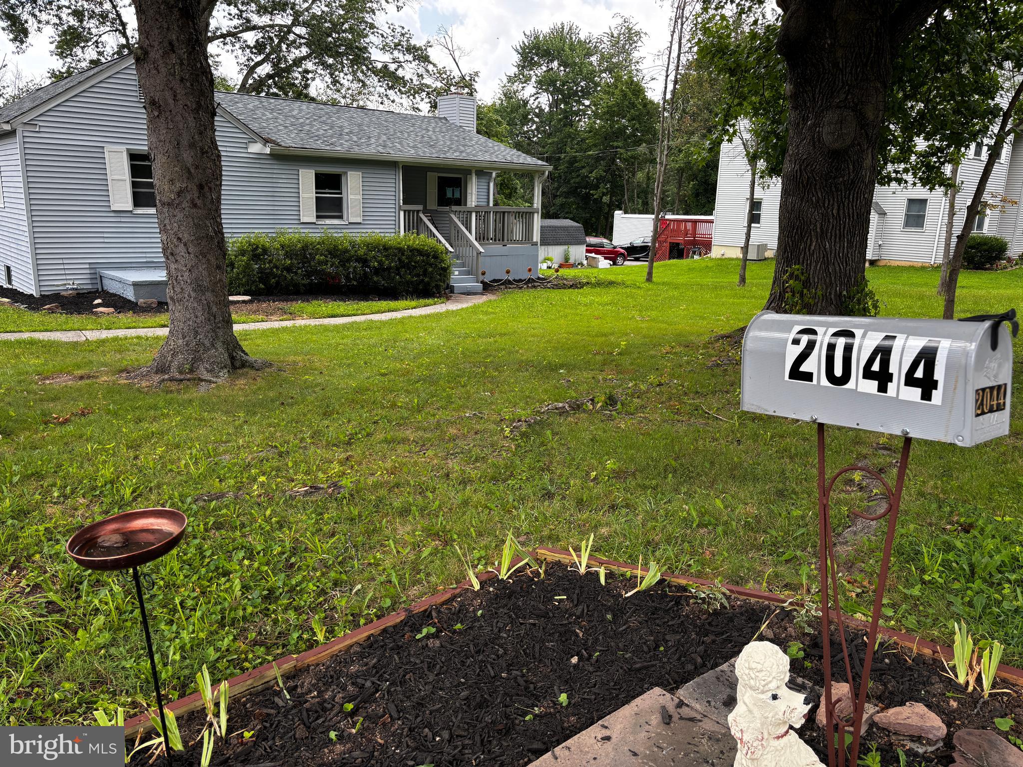 2044 Mill Road Norristown, PA 19403 - Photo 2 of 55 a view of a house with backyard and a tree