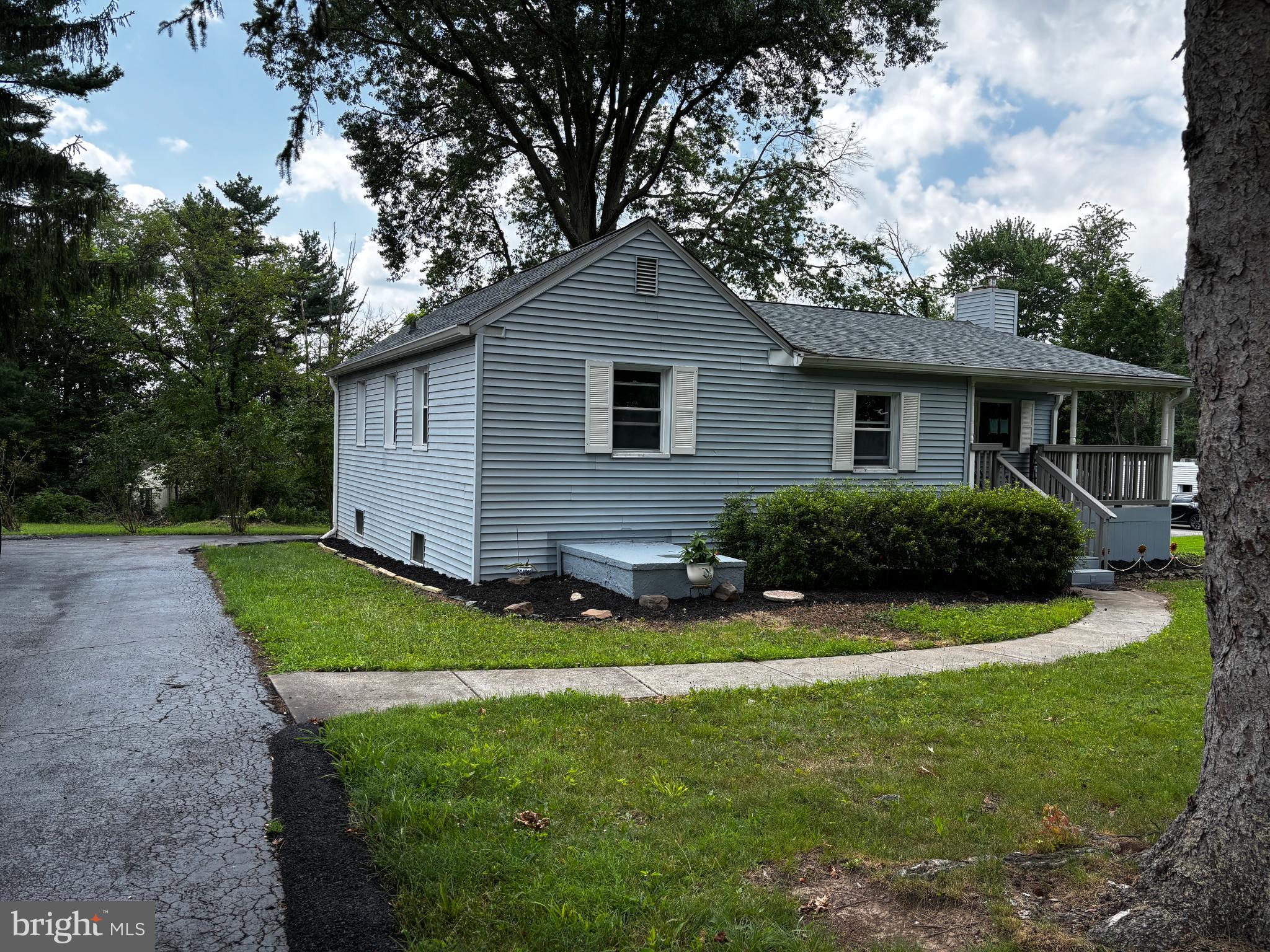 2044 Mill Road Norristown, PA 19403 - Photo 29 of 55 a front view of house with yard and green space