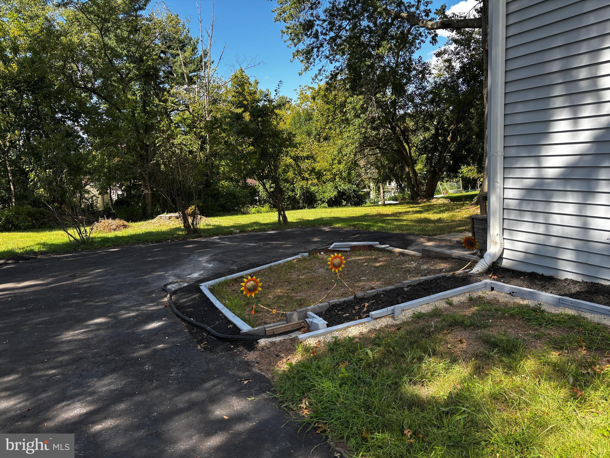 2044 Mill Road Norristown, PA 19403 - Photo 43 of 55 a view of a tennis ground with large trees