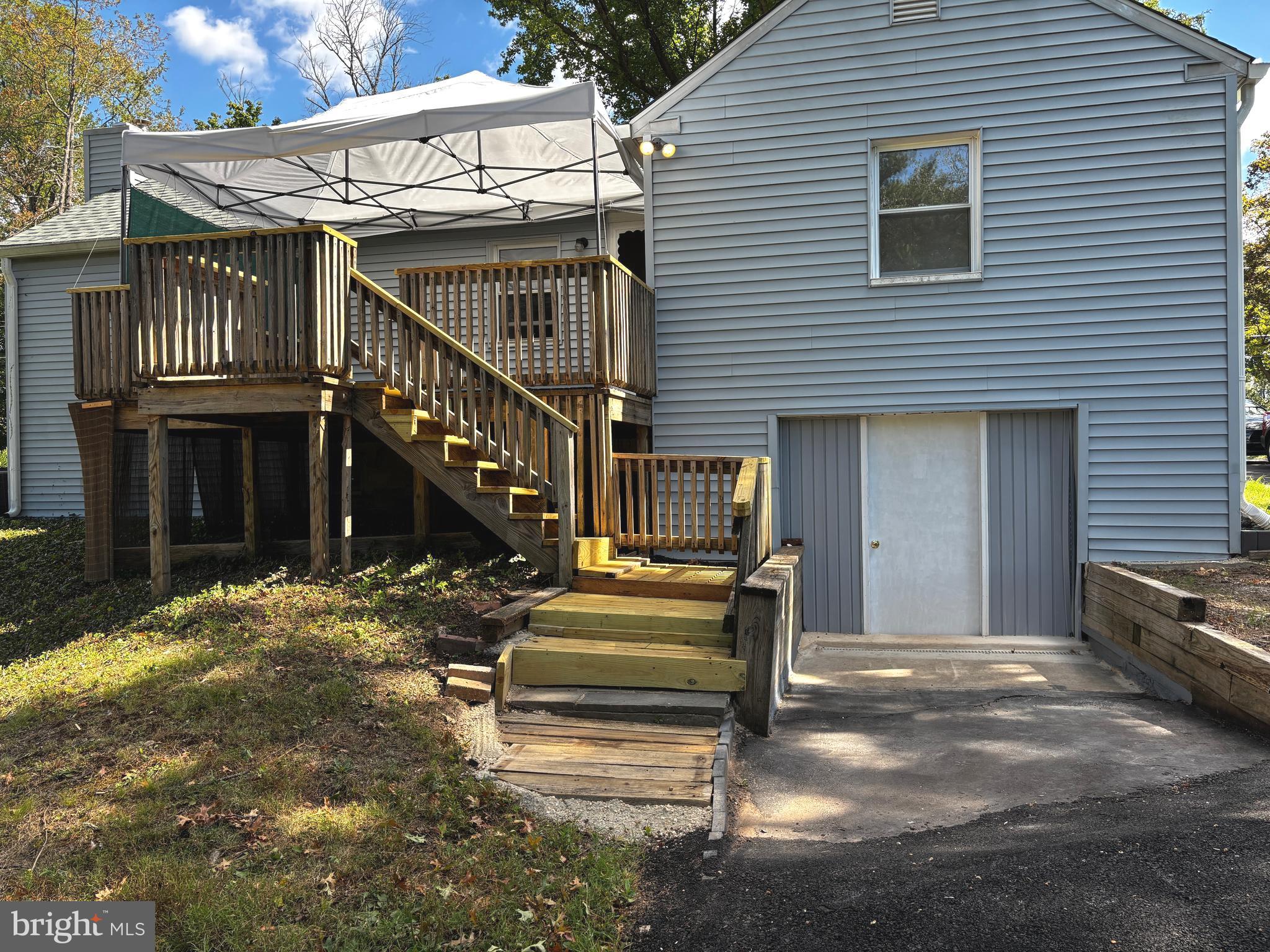 2044 Mill Road Norristown, PA 19403 - Photo 46 of 55 a view of a house with wooden stairs