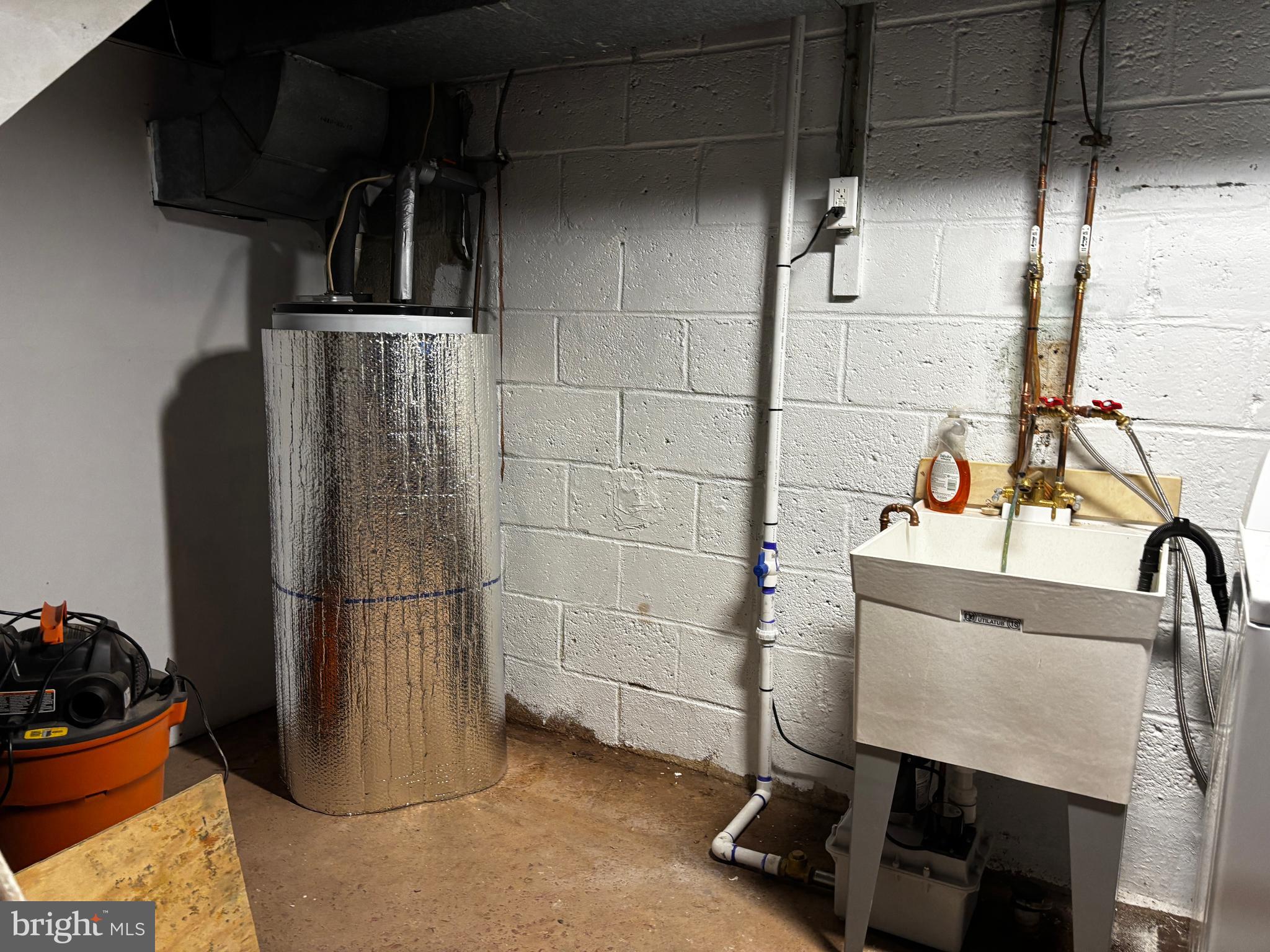 2044 Mill Road Norristown, PA 19403 - Photo 49 of 55 Hot water heater laundry sink