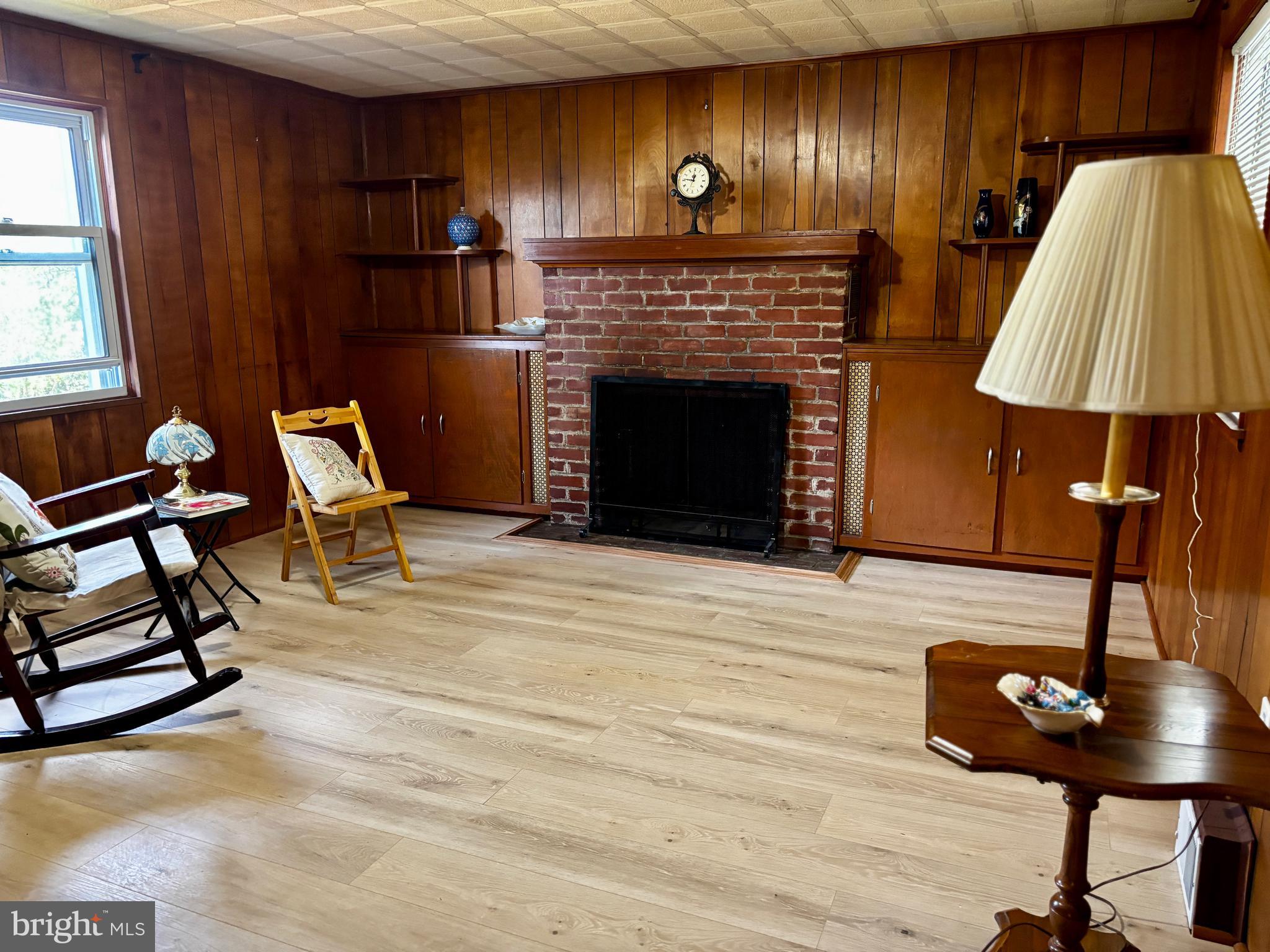 2044 Mill Road Norristown, PA 19403 - Photo 8 of 55 a living room with furniture and a fireplace
