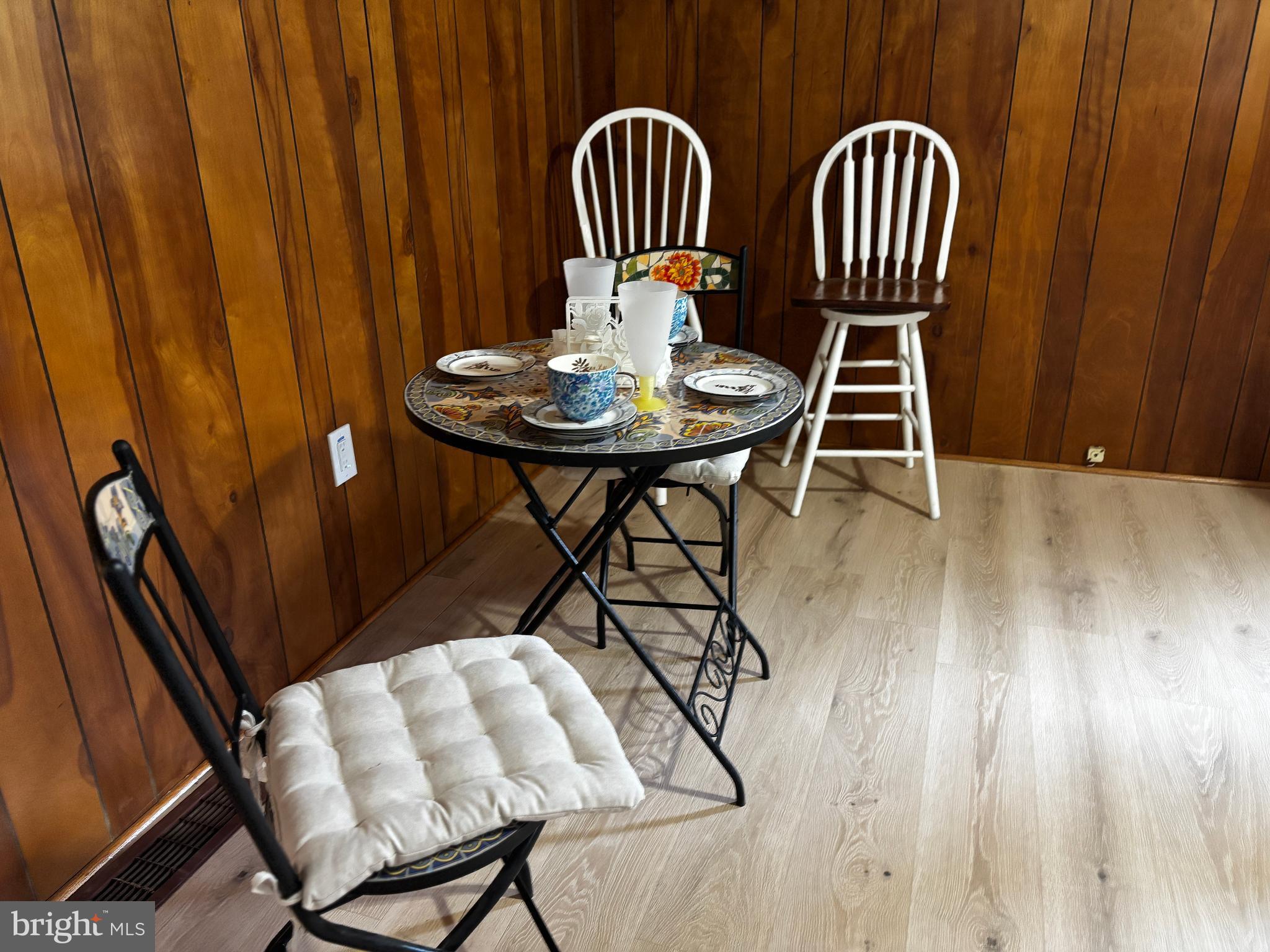 2044 Mill Road Norristown, PA 19403 - Photo 9 of 55 a view of a dining room with furniture and wooden floor