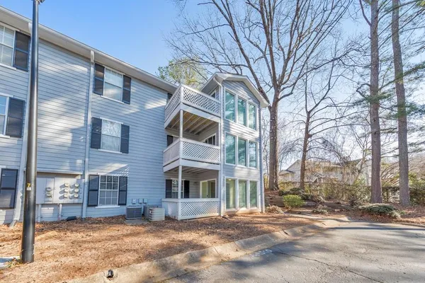 a view of a building with a snow in front of it