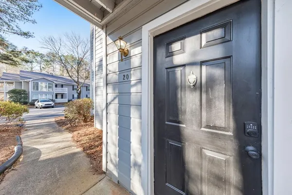 a view of a house with a street