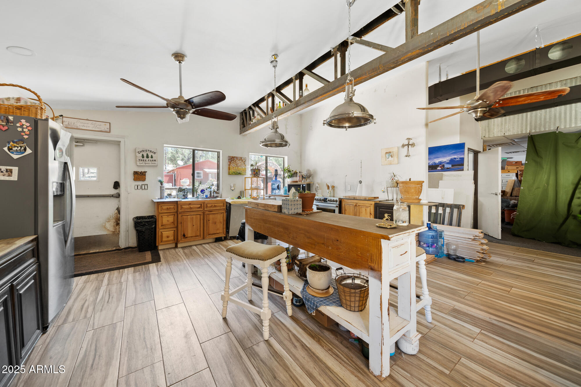 247 Standage Drive Payson, AZ 85541 - Photo 2 of 33 a living room with stainless steel appliances kitchen island granite countertop furniture