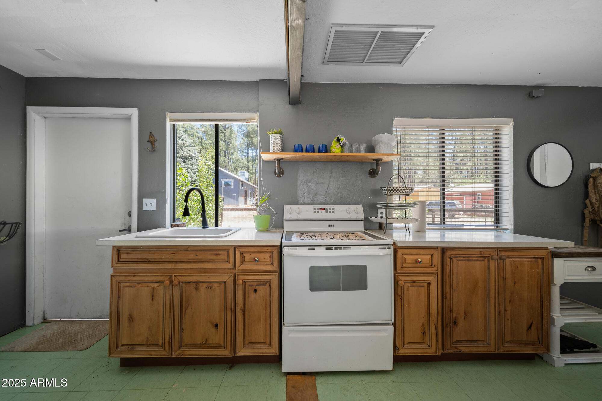 247 Standage Drive Payson, AZ 85541 - Photo 21 of 33 a kitchen with a stove and a sink