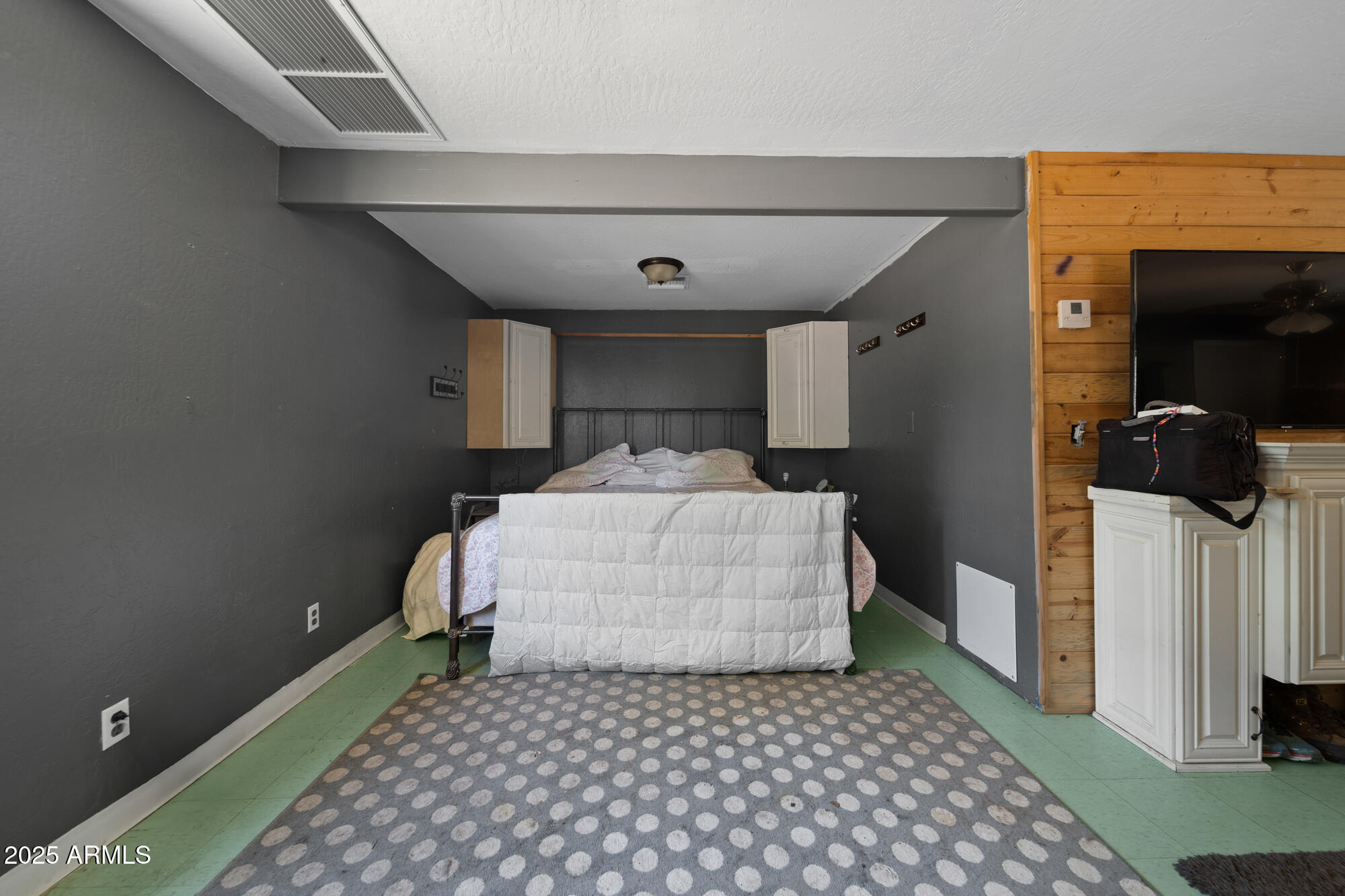 247 Standage Drive Payson, AZ 85541 - Photo 24 of 33 a bedroom with a bed and a window