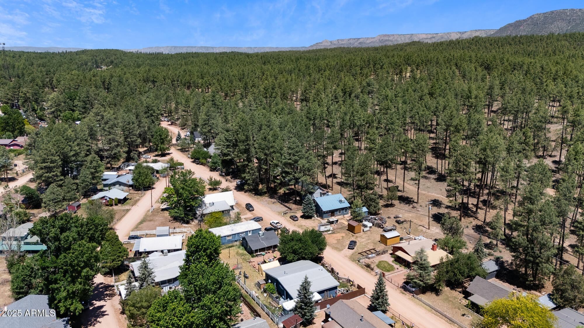 247 Standage Drive Payson, AZ 85541 - Photo 30 of 33 an aerial view of residential houses with outdoor space and trees