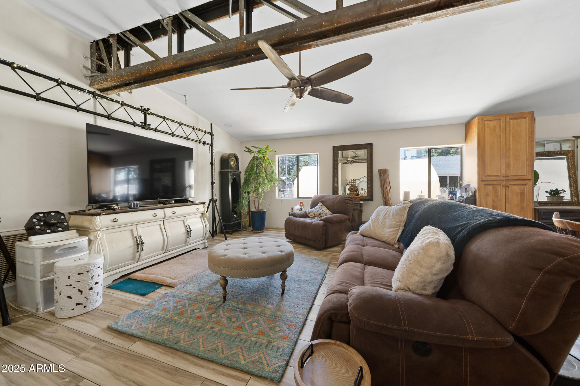 247 Standage Drive Payson, AZ 85541 - Photo 4 of 33 a living room with furniture and a flat screen tv
