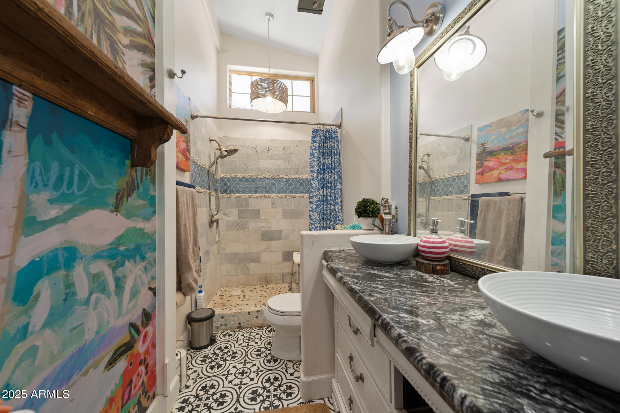 247 Standage Drive Payson, AZ 85541 - Photo 5 of 33 a bathroom with a granite countertop toilet a sink and a shower