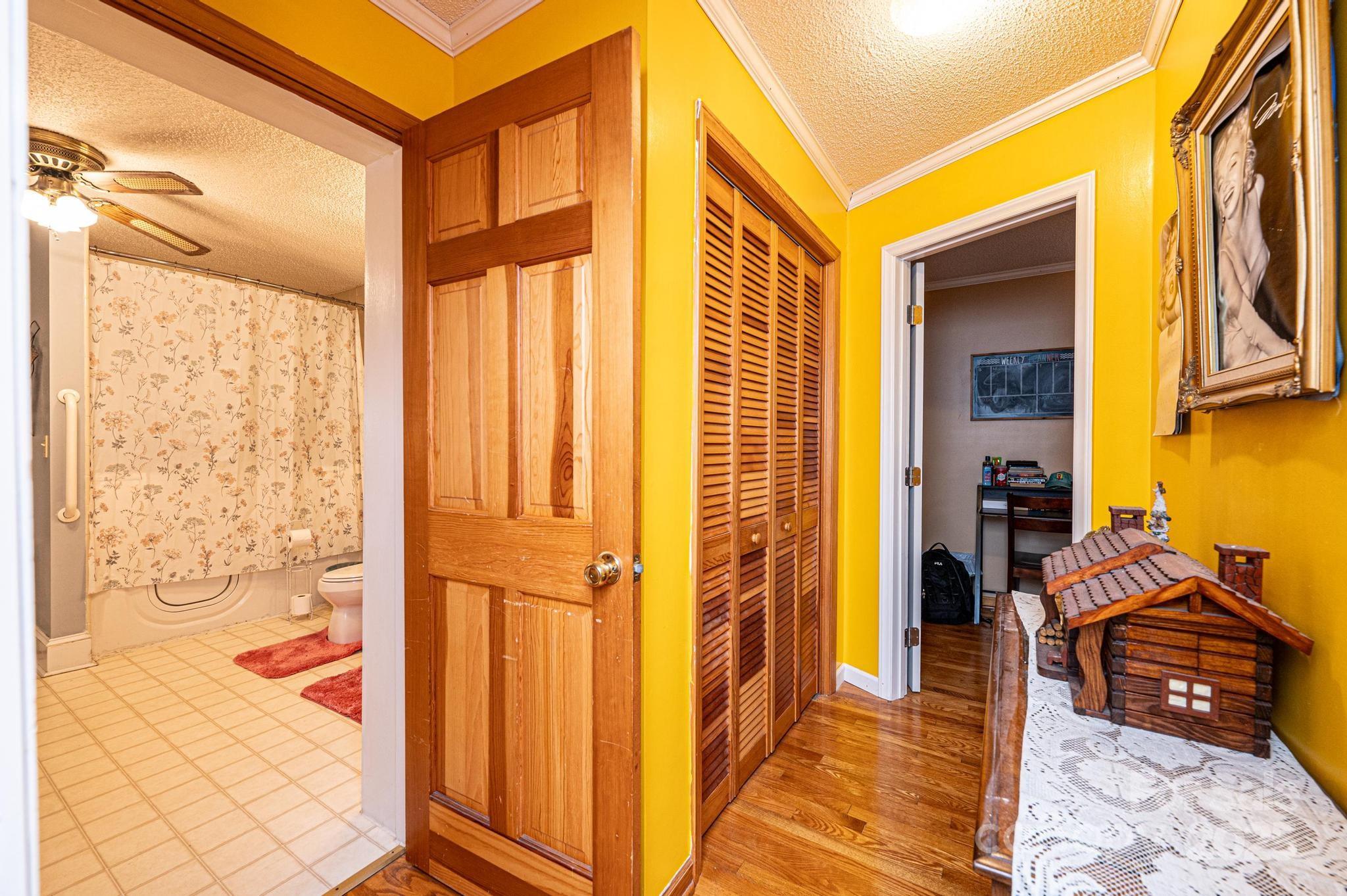 129 38th Street Northwest Hickory, NC 28601 - Photo 13 of 30 a view of a hallway and a livingroom with furniture