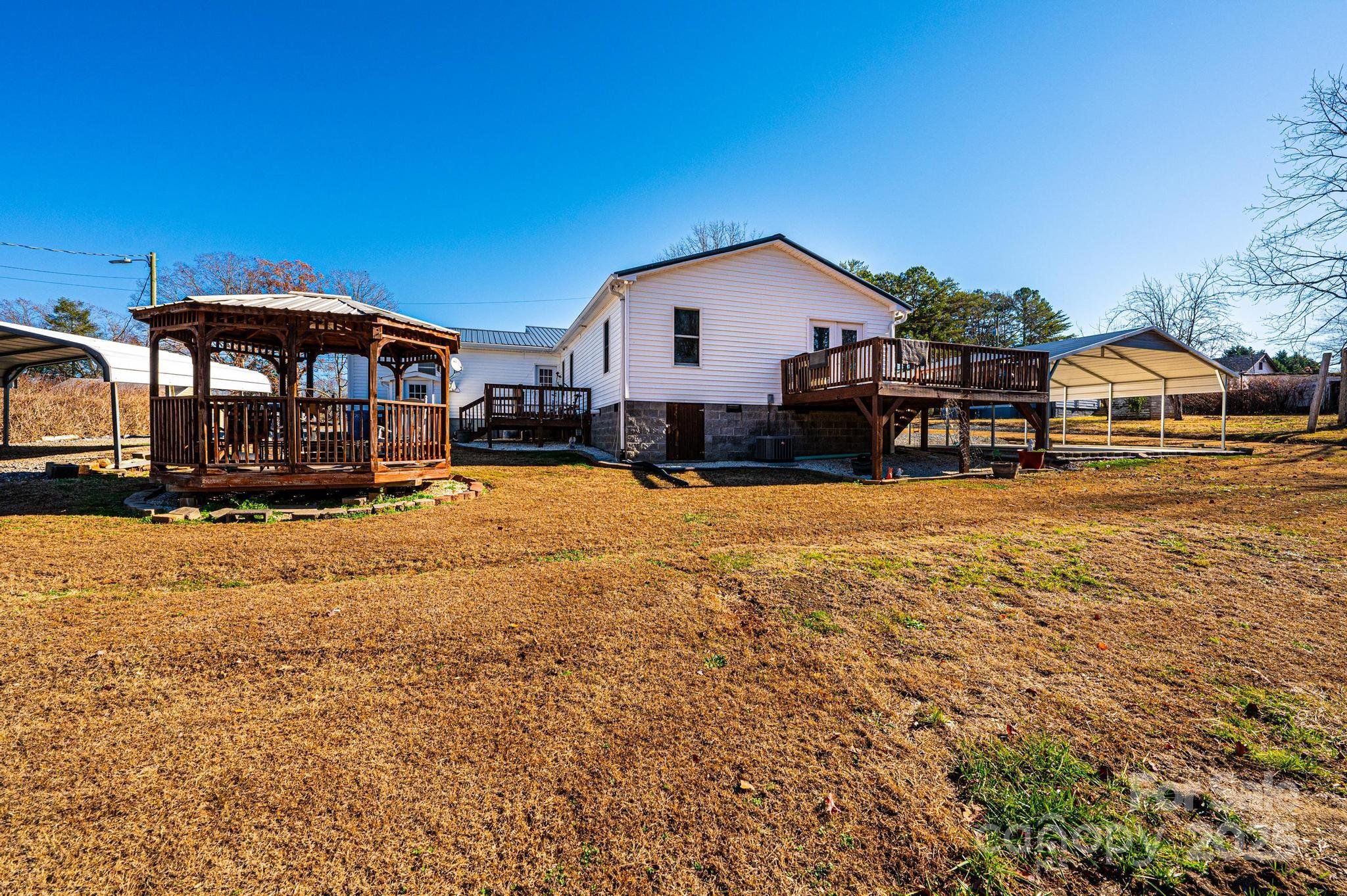 129 38th Street Northwest Hickory, NC 28601 - Photo 28 of 30 a view of a house with a yard