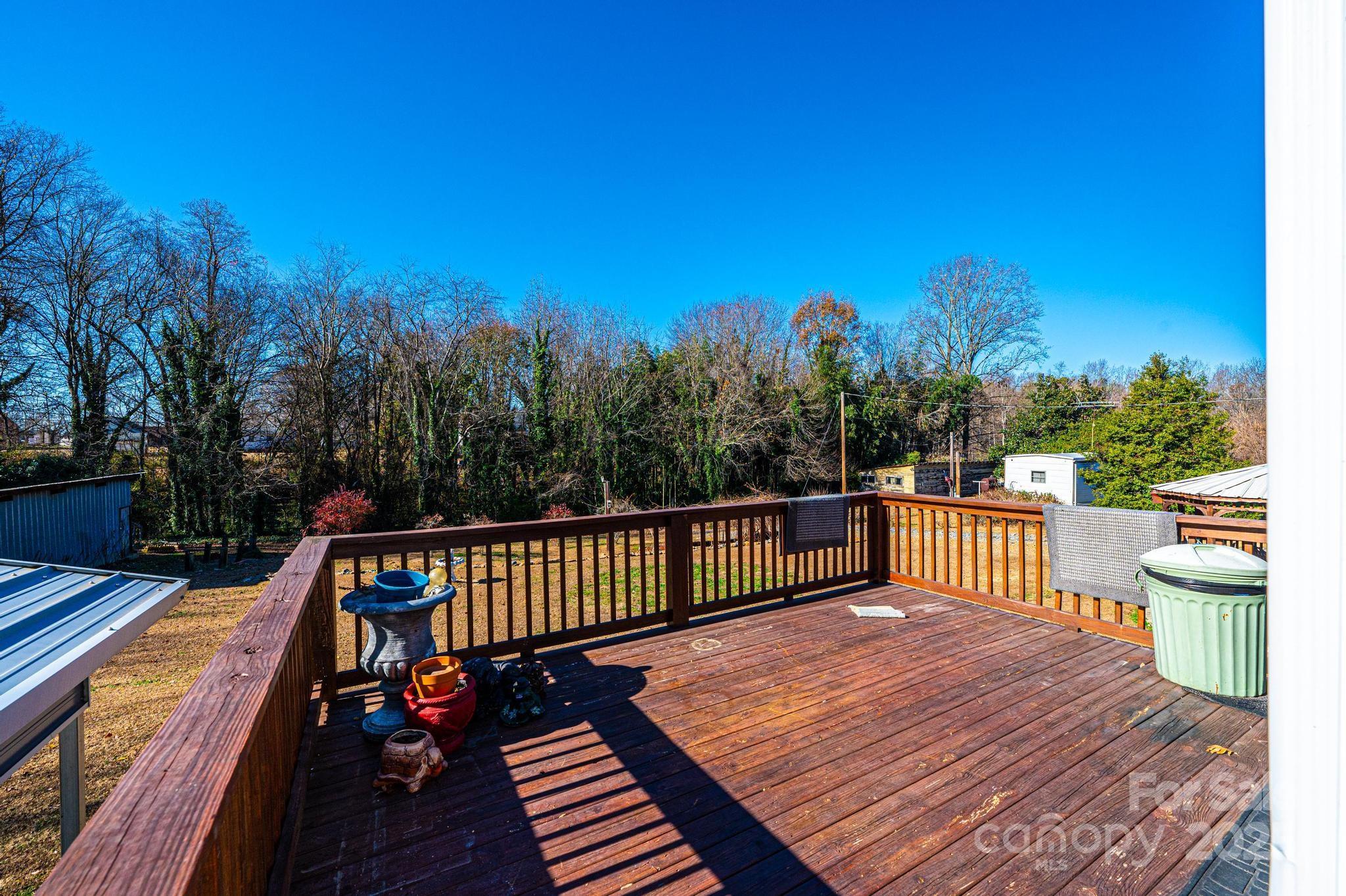 129 38th Street Northwest Hickory, NC 28601 - Photo 29 of 30 a view of a wooden deck with a bench