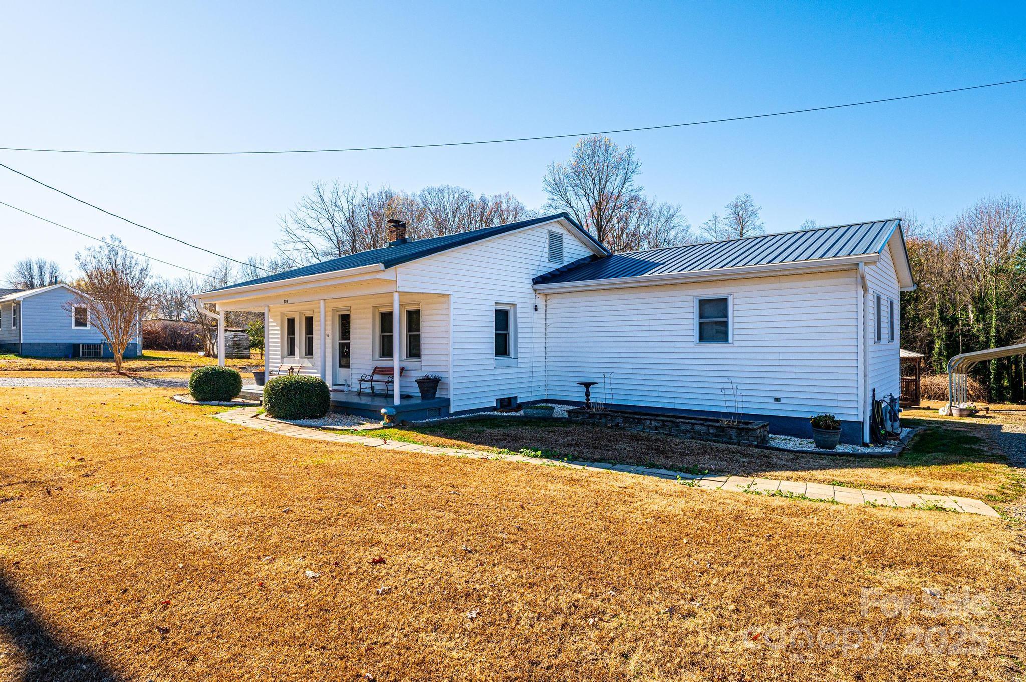 129 38th Street Northwest Hickory, NC 28601 - Photo 30 of 30 a view of a house with a patio