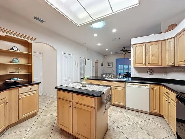 a workspace with furniture and window