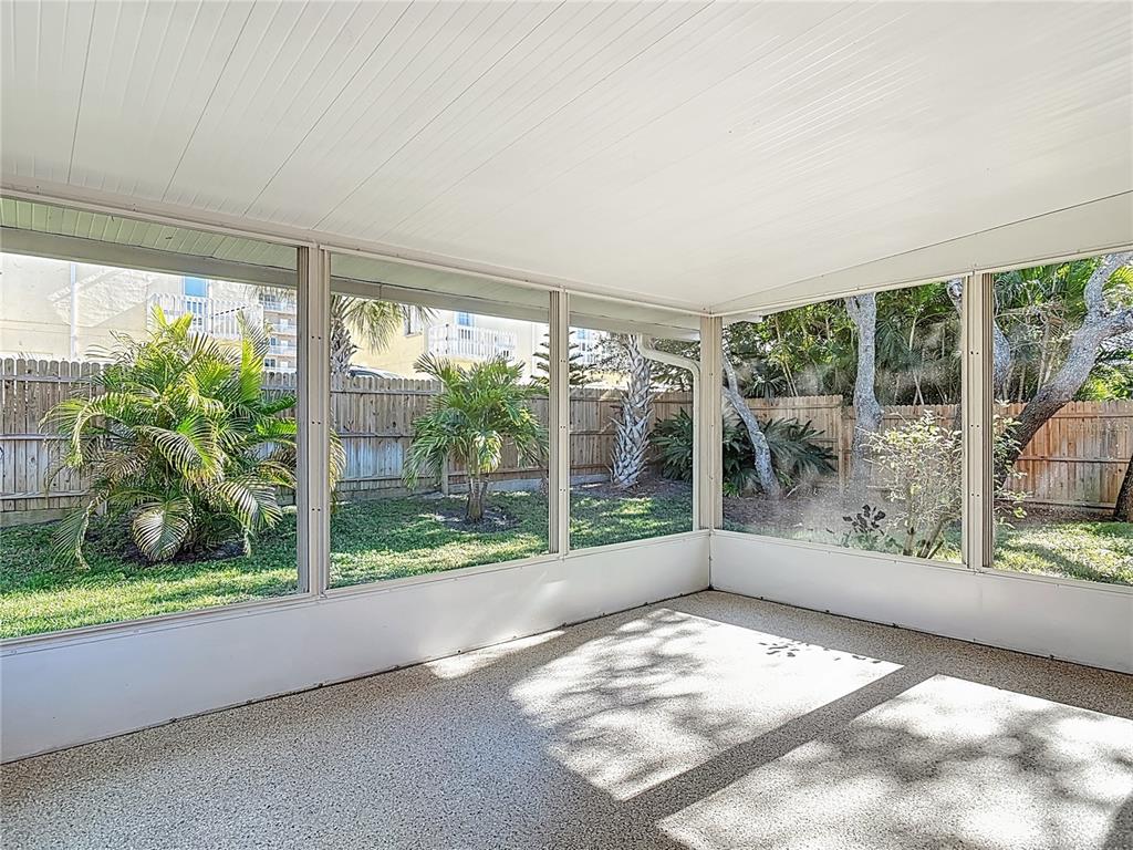 4761 Riverglen Boulevard Ponce Inlet, FL 32127 - Photo 29 of 50 a view of a room with porch and garden