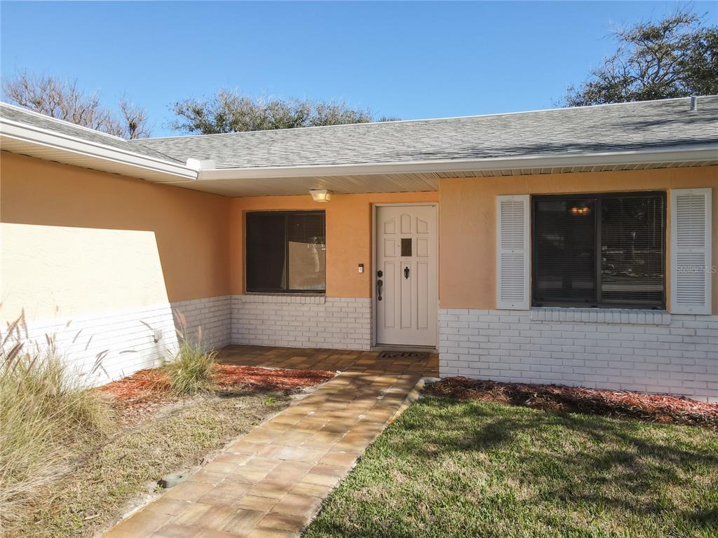 4761 Riverglen Boulevard Ponce Inlet, FL 32127 - Photo 4 of 50 a view of a house with a backyard