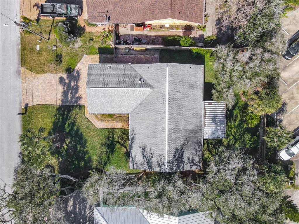 4761 Riverglen Boulevard Ponce Inlet, FL 32127 - Photo 41 of 50 an aerial view of a house with a yard
