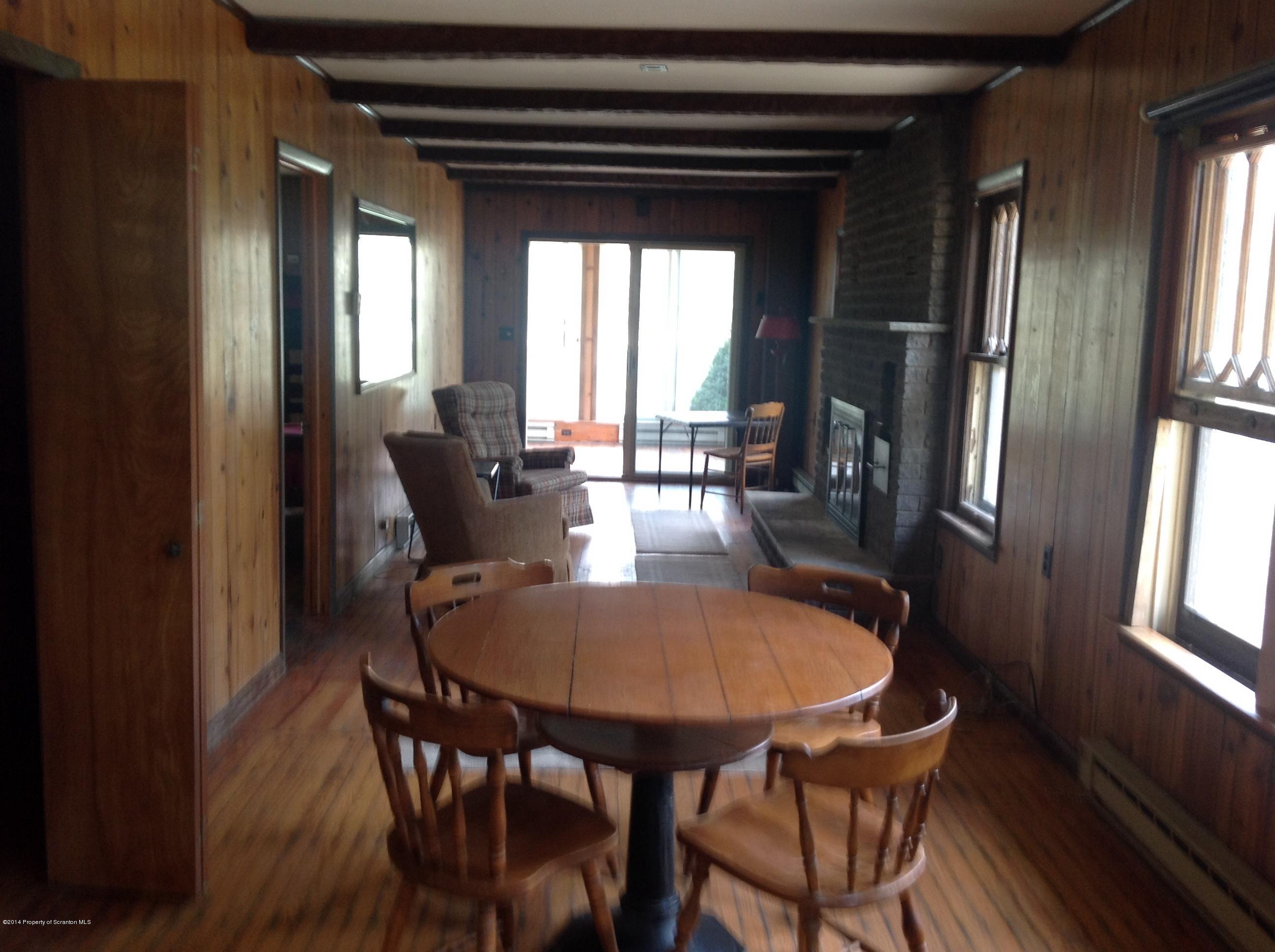 303 River Road Falls, PA 18615 - Photo 11 of 15 a dining room with furniture and window