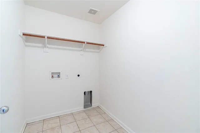 a view of a house with a garden and yard