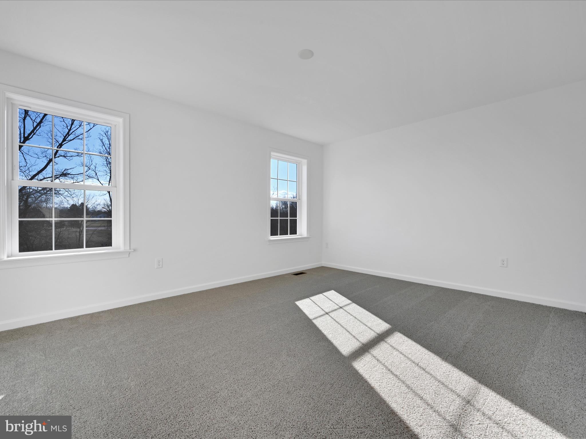 4 Stream Drive Carlisle, PA 17013 - Photo 13 of 39 a view of an empty room with windows