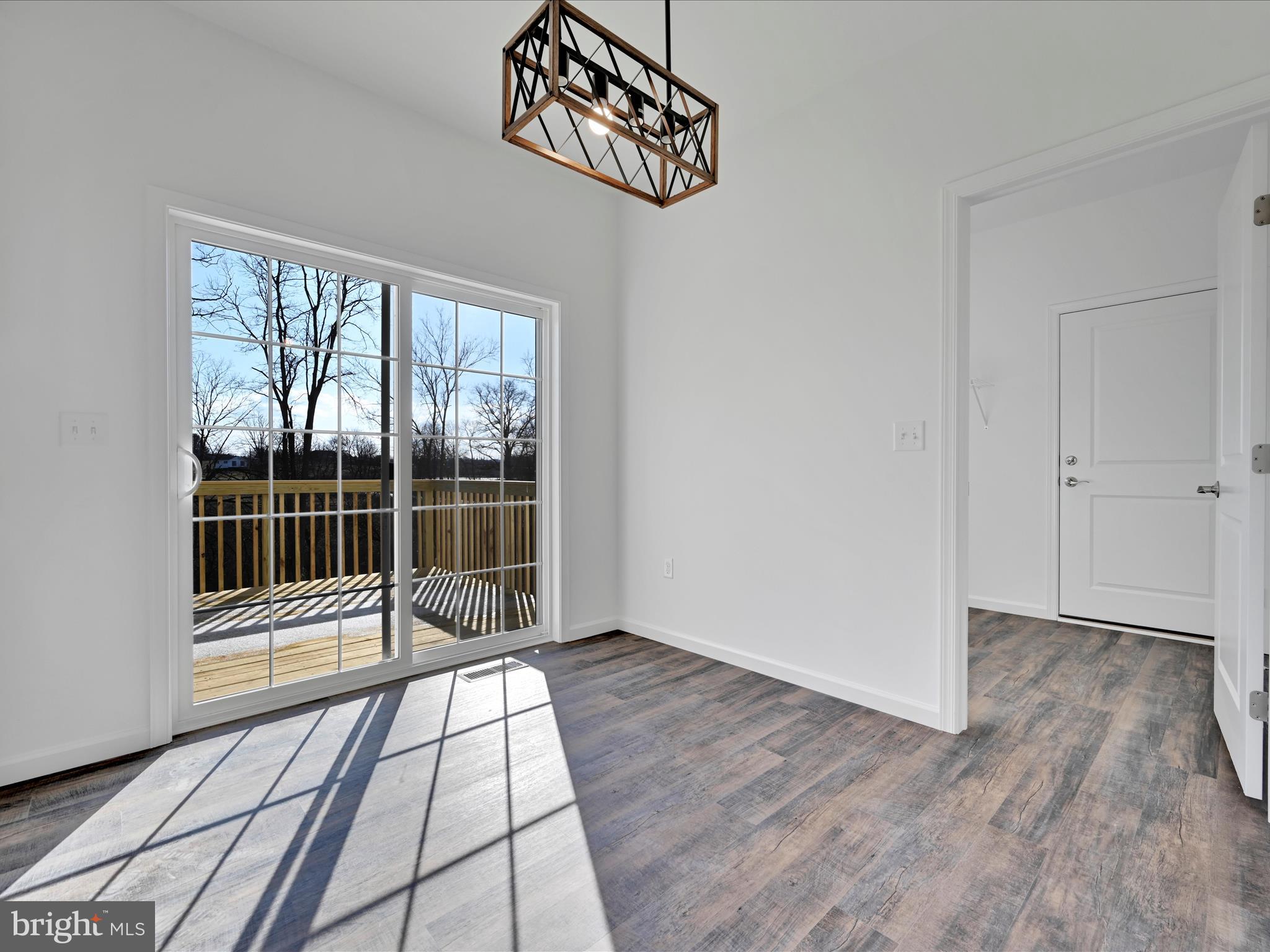 4 Stream Drive Carlisle, PA 17013 - Photo 5 of 39 a view of empty room with wooden floor and fan