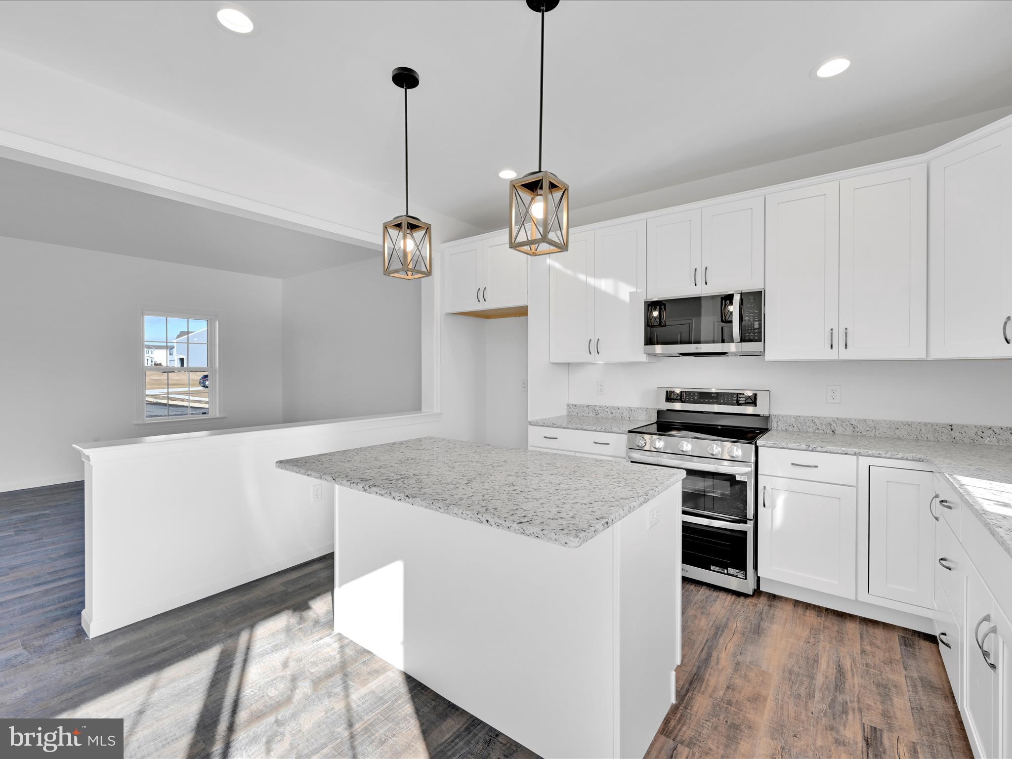 4 Stream Drive Carlisle, PA 17013 - Photo 7 of 39 a kitchen with appliances cabinets and wooden floor