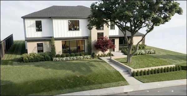 a front view of a house with a yard