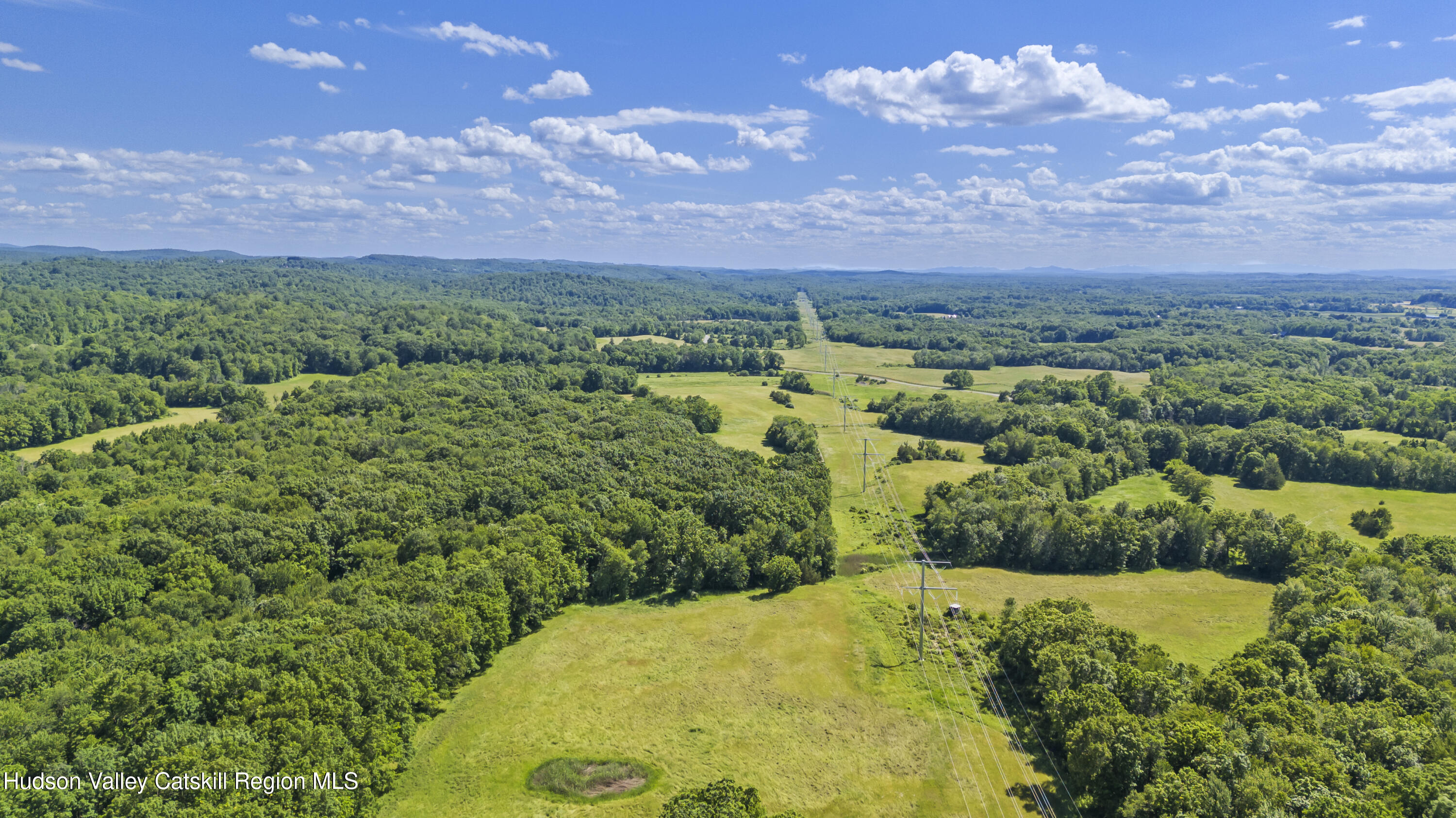 0 Lockwood Road Hudson, NY 12534 - Photo 8 of 11 a view of a big yard with lots of green space and mountain view