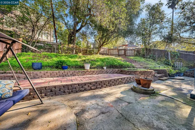 a garden view with a seating space