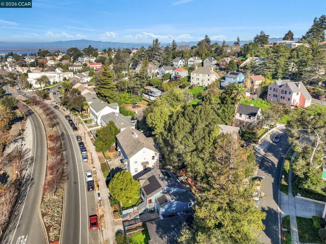 a view of a city with ocean view