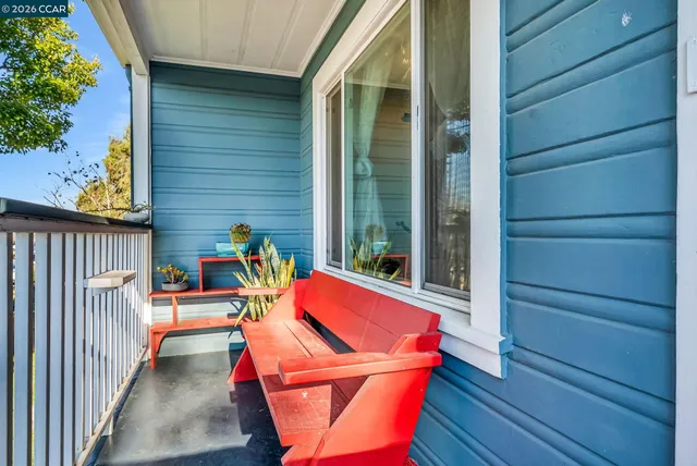 a view of sitting area with chairs in wooden deck