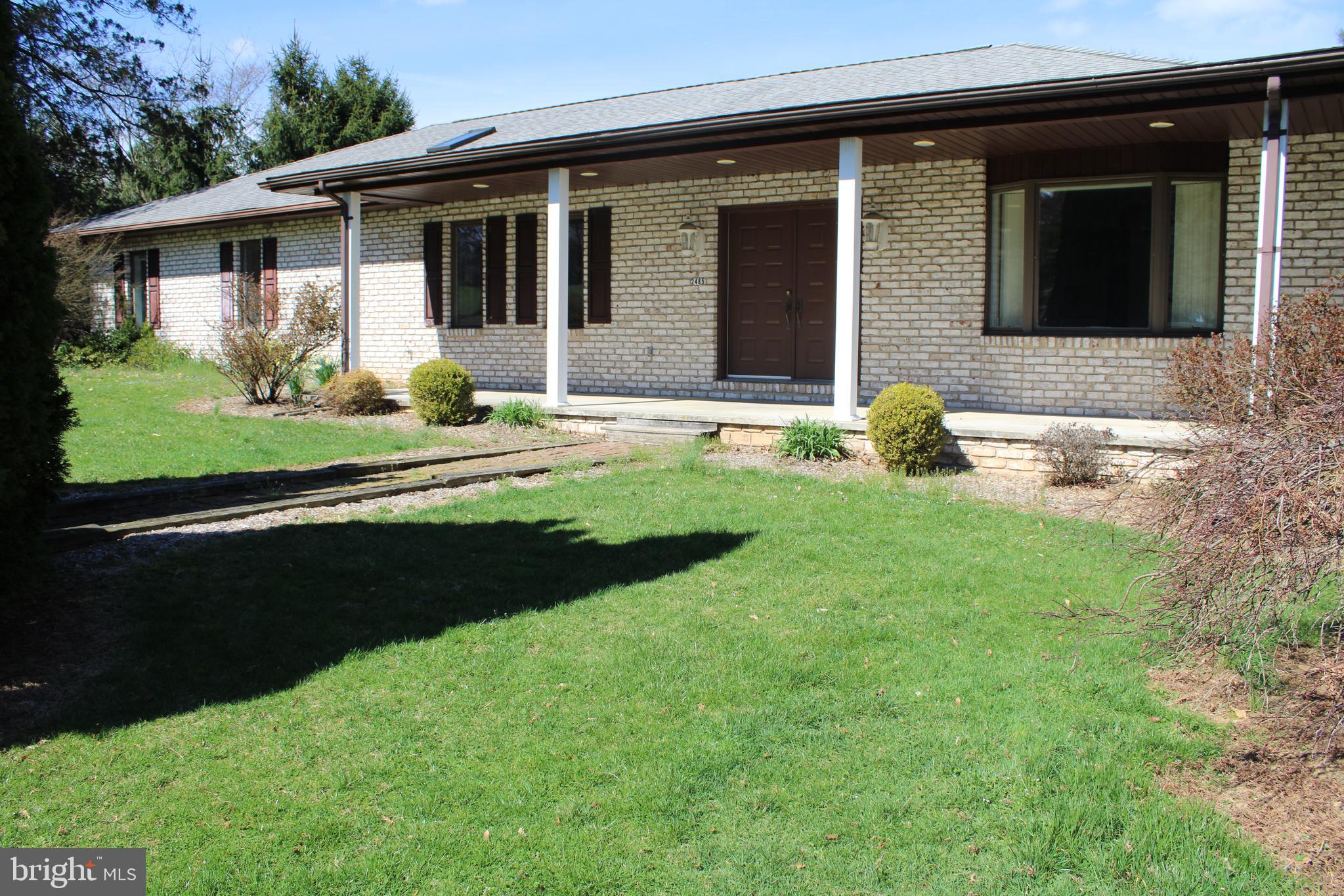 2485 Joppa Road York, PA 17403 - Photo 1 of 14 a front view of a house with garden