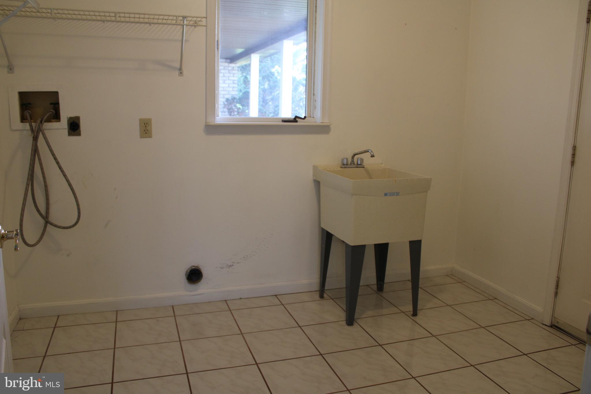 2485 Joppa Road York, PA 17403 - Photo 5 of 14 a bathroom with a sink and a mirror