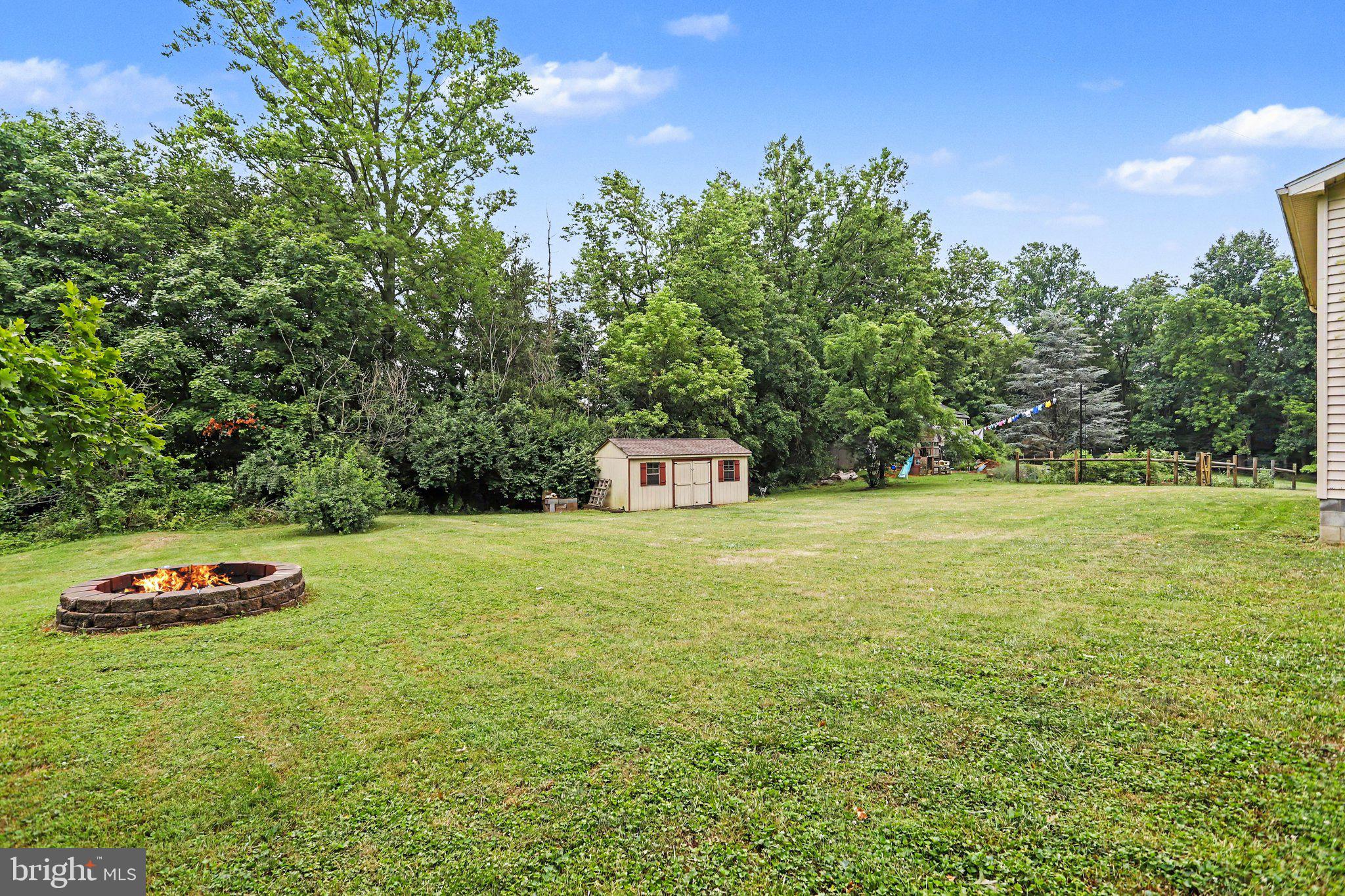 381 Ironstone Ridge Road Lancaster, PA 17603 - Photo 27 of 30 Spacious yard with fire pit and shed.