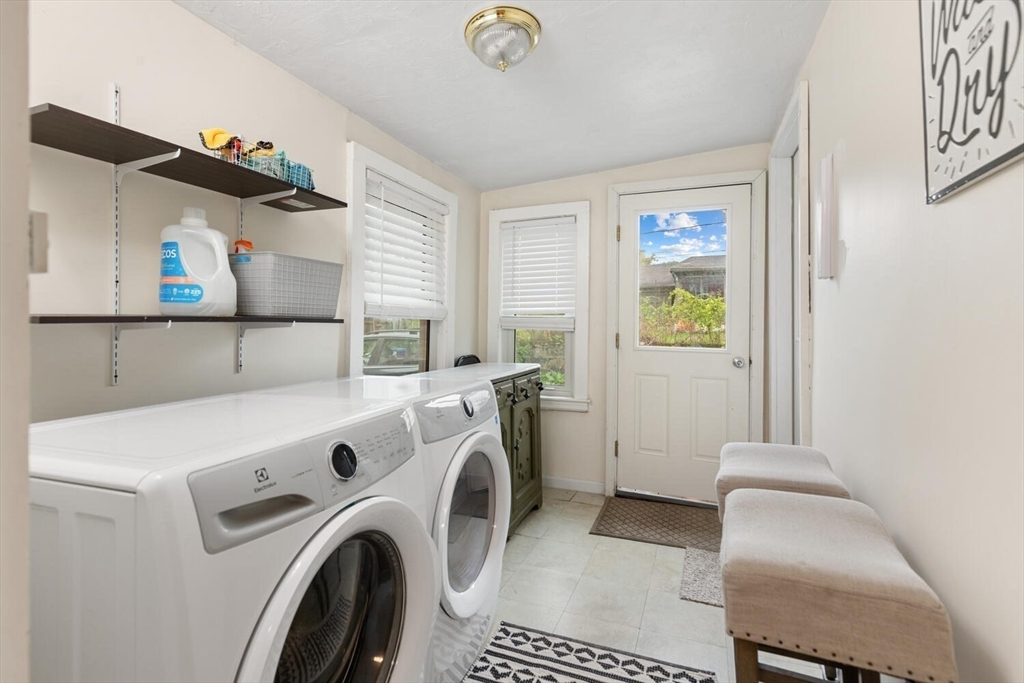 12 Wright Street, Unit 2 Stoneham, MA 02180 - Photo 22 of 35 a utility room with dryer and washer